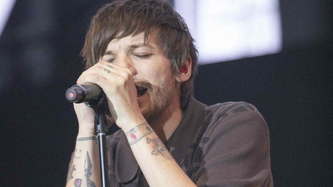 Louis Tomlinson felt pressure to match success of One Direction bandmates