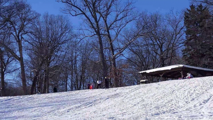 Snow Tubing Sledding Fail Mom slides into boy