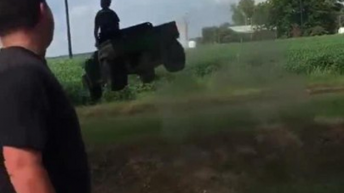Guy Drives Gator on Ditch and Jumps Unexpectedly High in Air
