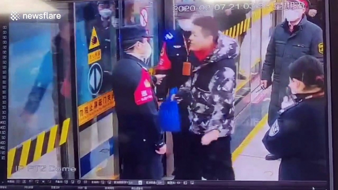 Chinese man attacks police officers who stop him from boarding train without wearing mask during coronavirus outbreak