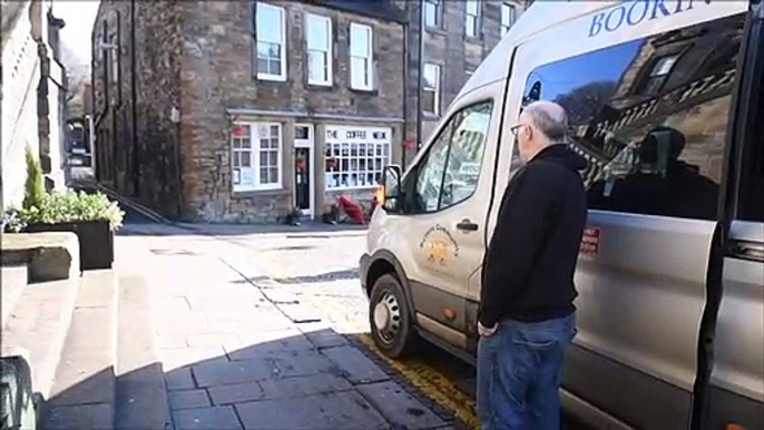 Mary Queen of Scots takes a lift on the Bo'ness Community Bus heading to HippFest