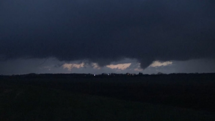 Multiple funnel clouds pop up across the horizon