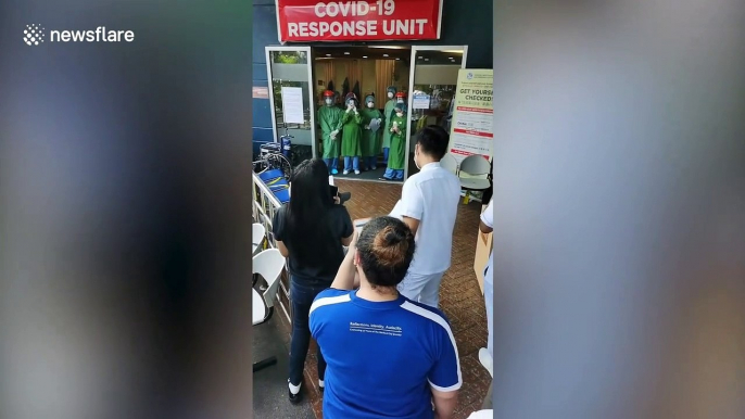 Emotional moment well-wishers sing to doctors and nurses treating coronavirus patients