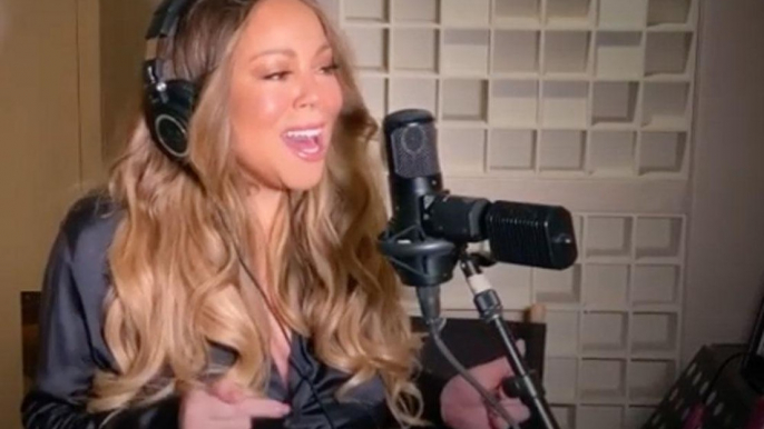 Mariah Carey performs Always Be My Baby with 'fan' blowing her hair