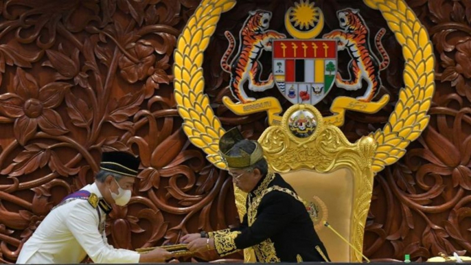 King upholds Muhyiddin as Malaysia PM in brief Parliament sitting