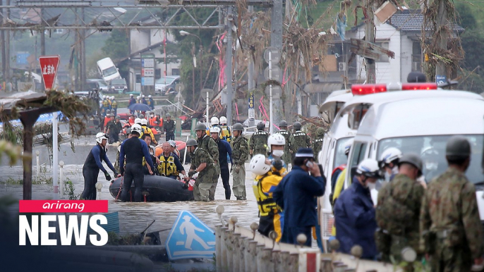 Torrential rain in China and Japan kills scores