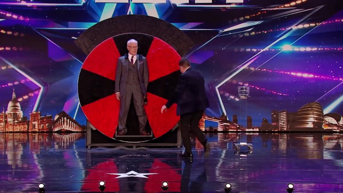 Magician Puts Father on Spinning Wheel on Britain's Got Talent - Magicians Got Talent