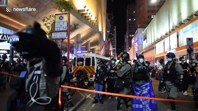 Riot police and protesters continue clashes in Hong Kong