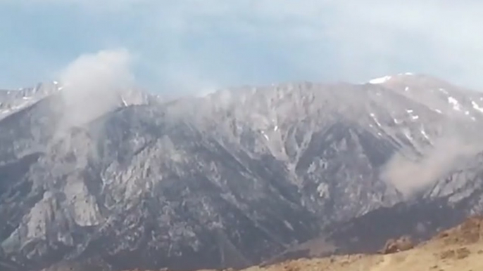 Dust clouds form from mountains after earthquake