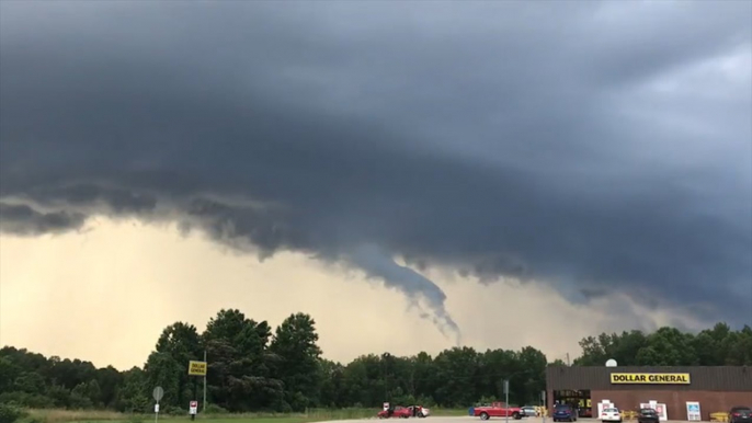 Ominous clouds loom in the distance