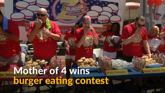 US mom of four defends burger eating title