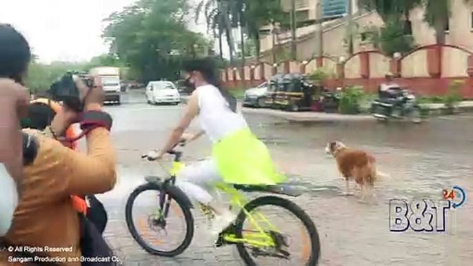 Beautiful Sonal Chauhan Enjoying Cycling in A Rainy Day at The Roads of Mumbai