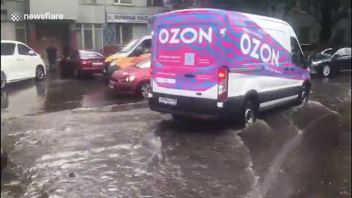 Moscow was hit by a heavy downpour as roads in Russia become dangerous