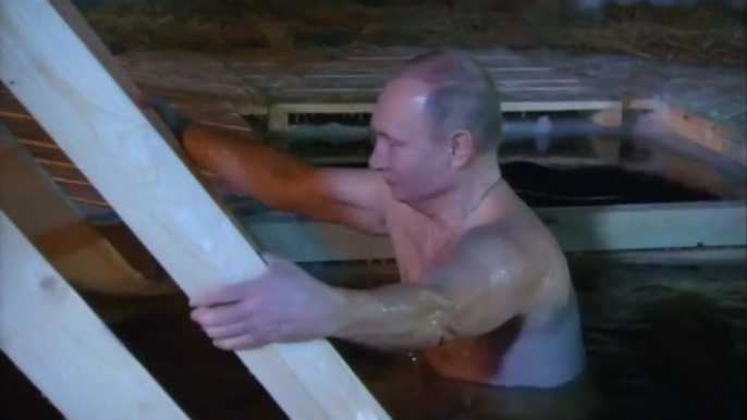 Russia's Putin takes dip in icy lake to mark Orthodox Epiphany