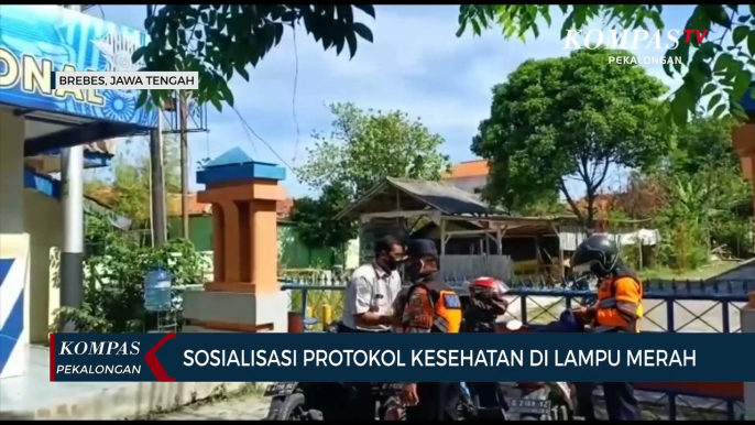 Sosialisasi Protokol Kesehatan Gunakan Pengeras Suara Pada Lampu Lalu Lintas