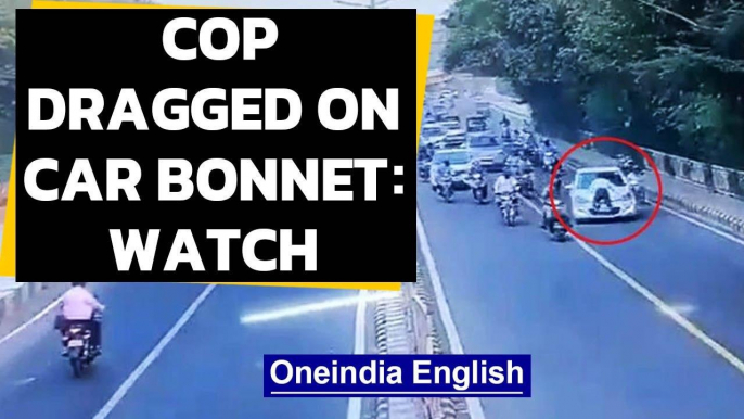 Cop dragged on bonnet of car in Delhi | Caught on camera | Oneindia News