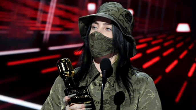 Billie Eilish wants people to wear their mask as she speaks at the Billboard Music Awards