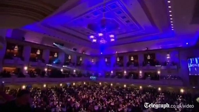 Obama and Romney trade jokes at New York charity dinner