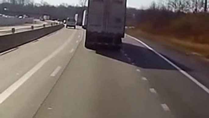 Distracted Truck Driver Nearly Topples Trailer