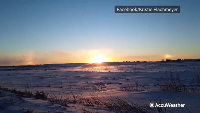 Sun dog spotted over frozen Minnesota landscape