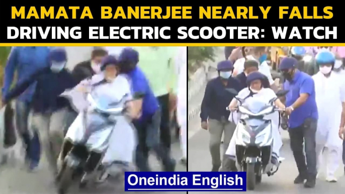 Mamata nearly falls off scooter | Didi rides e-bike to protest | Oneindia News