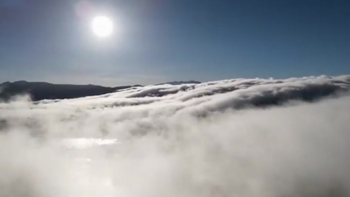 Clouds flow like water in time-lapse video