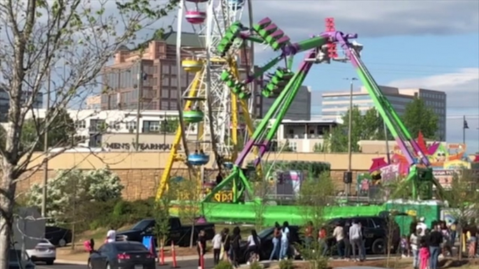 Families enjoy carnival rides in Atlanta