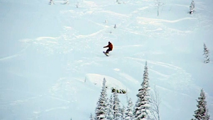 Talented young man doing stunt in the snow ⛷