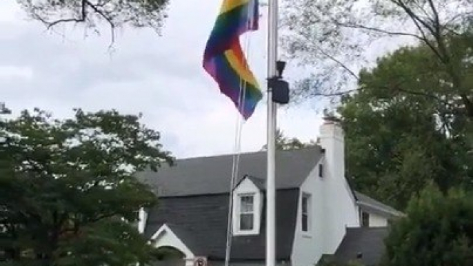 Neighborhood Celebrates Pride Month By Raising Rainbow Flag Along With U.S. Flag