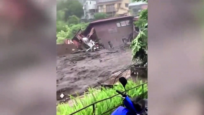 Japan rescue work continues after deadly landslides