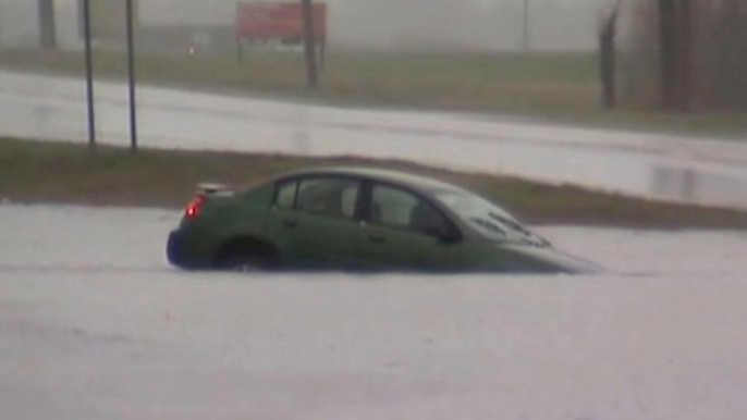 How to break out of a flooded car