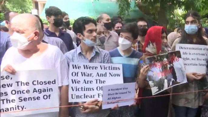 Afghans protests outside UNHRC refugees office in Delhi