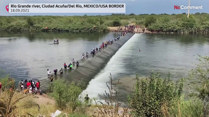 Migrants crossing Rio Grande to US border from Mexico