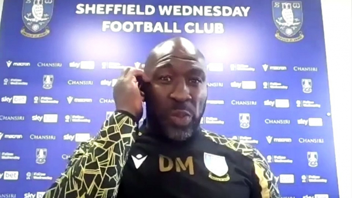 Darren Moore likes the pressure of Sheffield Wednesday