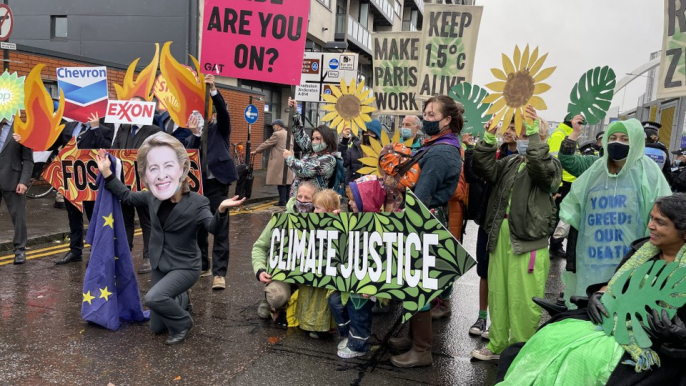 COP26: Fossil fuels or a liveable planet? Protesters march outside climate summit venue