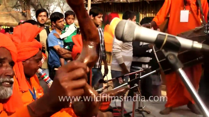 People dancing with folk music players at Surajkund Mela...