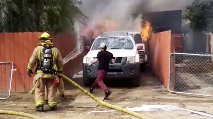 Watch As This Man Risks His Life By Going Into A Burning House On Fire To Save His Dog