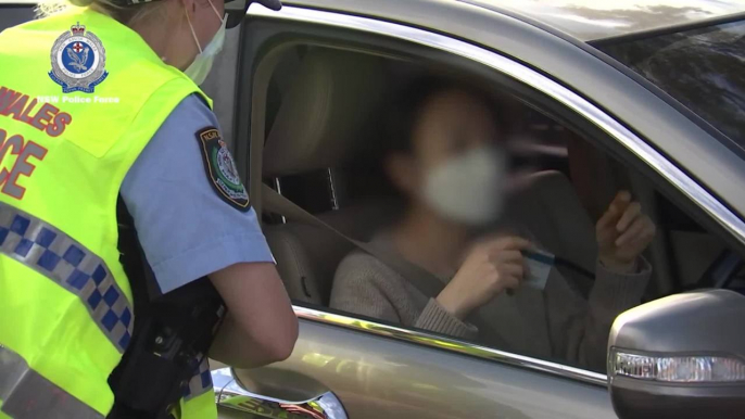 Police conducting car checks on Roberts Road, Merrylands NSW during Operation Stay At Home - August 2021 - ACM