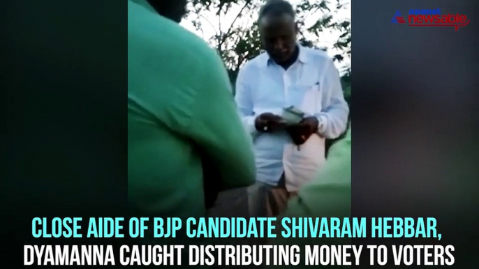 Karnataka by-polls: Political leader caught luring voters with money