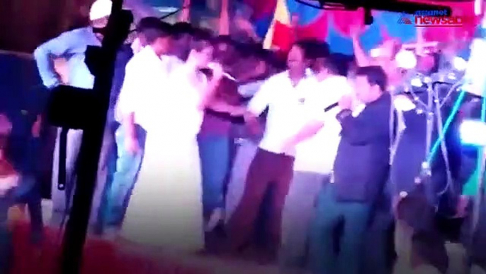 At a religious function, Karnataka MLA caught dancing with a female singer