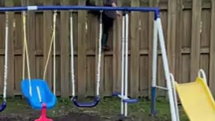 Kid Gets Stuck Trying to Climb Fence