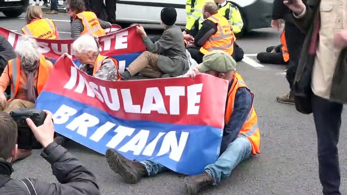 Insulate Britain block road outside Houses of Parliament