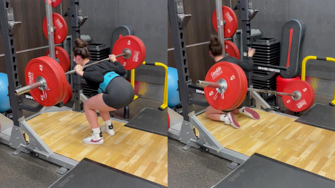 Woman trying to squat while holding a HEAVY barbell experiences a COMEDIC fail moment