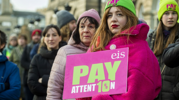 Members of the EIS demonstrate outside Bute House in Edinburgh as teachers from secondary schools around Scotland are shut as members of the EIS and SSTA unions take strike action