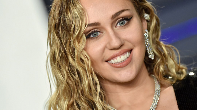 Miley Cyrus Paired Her High-Cut White Bikini With Even Higher Stilettos