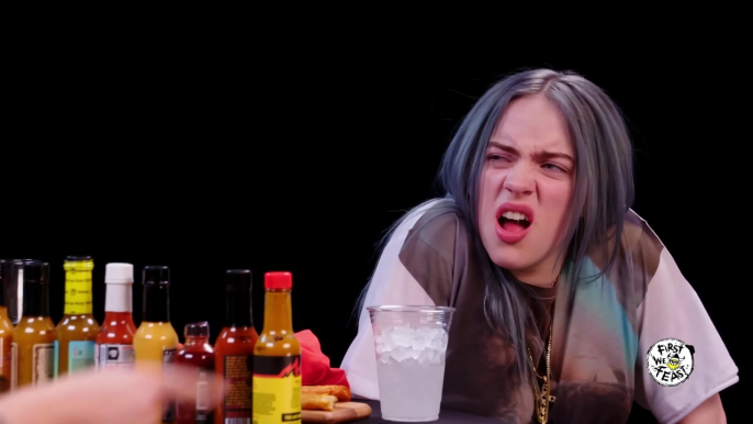 Billie Eilish Freaks Out While Eating Spicy Wings | Hot Ones | First We Feast