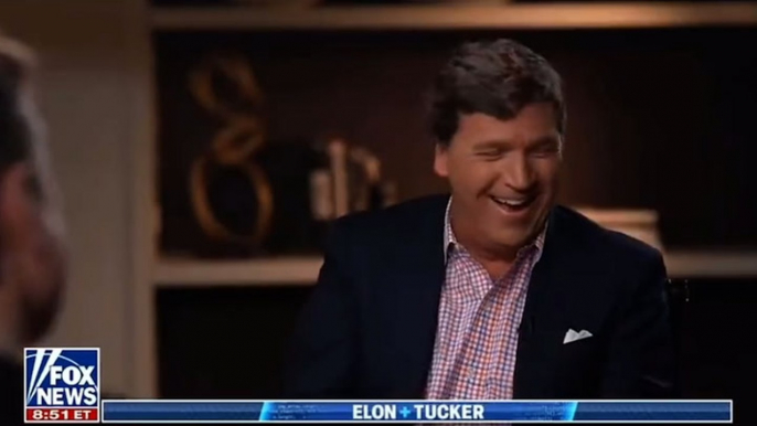 Fox host Tucker Carlson laughs as Elon Musk discusses Twitter layoffs