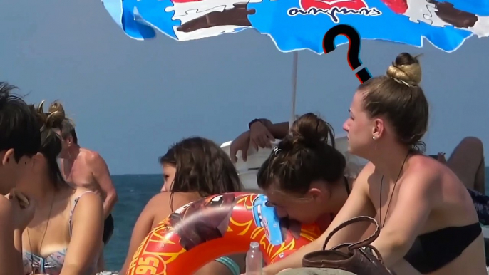 Funny crazy Girl prank on the beach AWESOME REACTIONS Just For Laughs