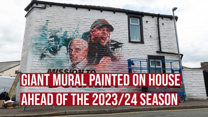 Mission to Burnley mural painted on side of house opposite Turf Moor