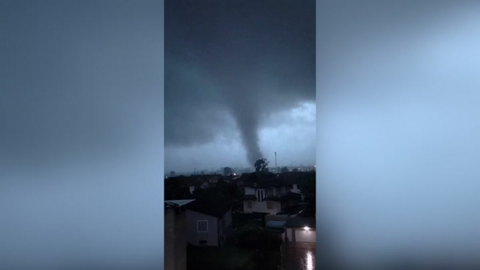 Tornado tears through Milan suburb as extreme weather sweeps Italy